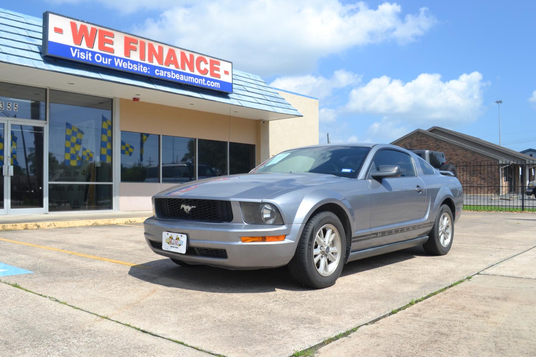 2006 Tungsten Grey Metall /Light Graphite Cloth Ford Mustang V6 Deluxe Coupe (1ZVFT80N665) with an 4.0L V6 SOHC 12V engine, located at 1355 North 11th Street, Beaumont, 77702, (409) 832-0006, 30.094290, -94.130096 - Photo #0